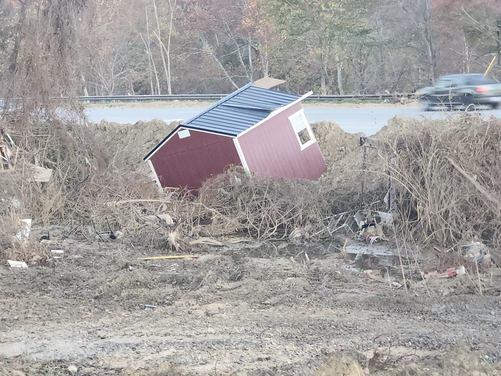 Shed displaced after flooding