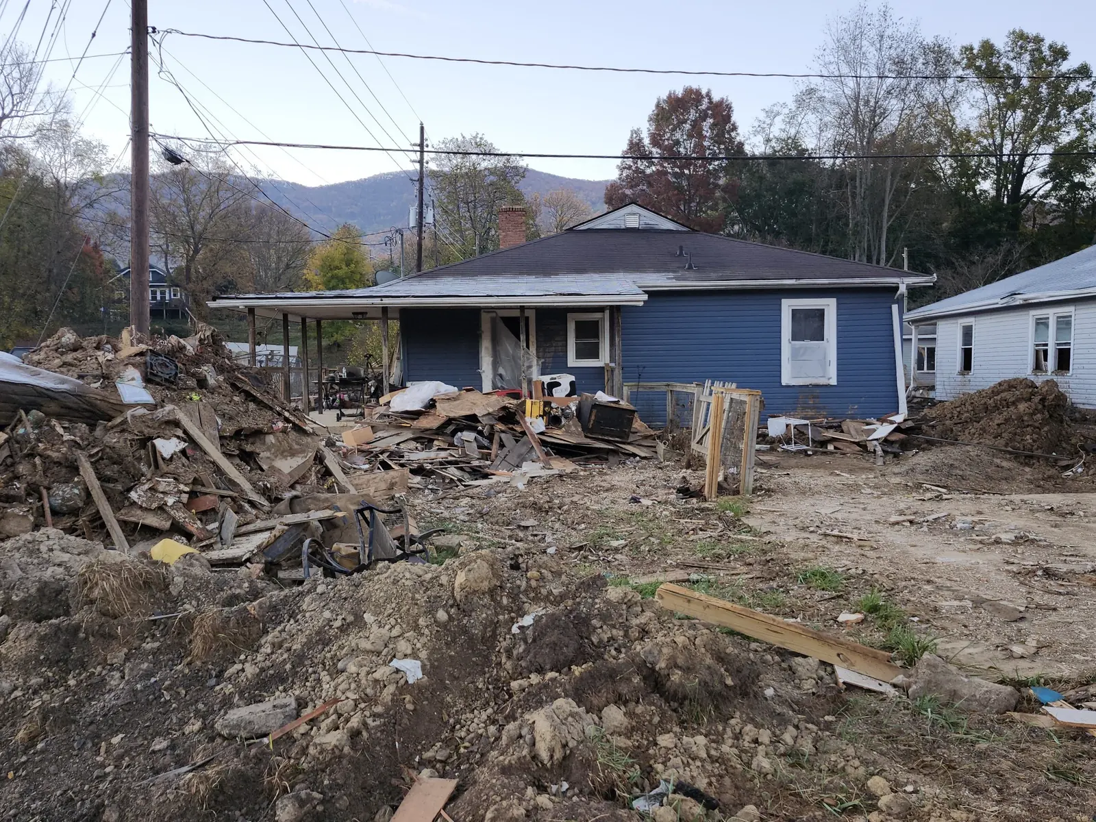 Home surrounded by storm debris